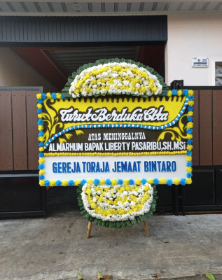 Papan Bunga Duka di Kampung Melayu