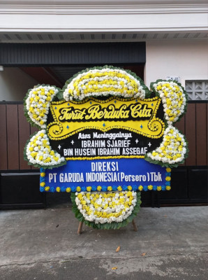 Papan Bunga Duka di Kampung Melayu